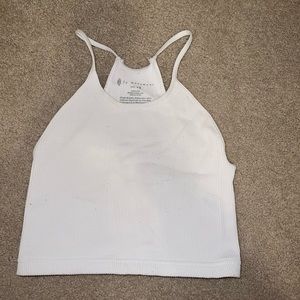 Happiness runs crop tank